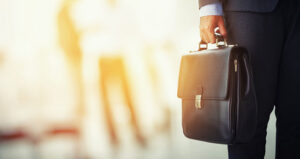 businessman holding briefcase